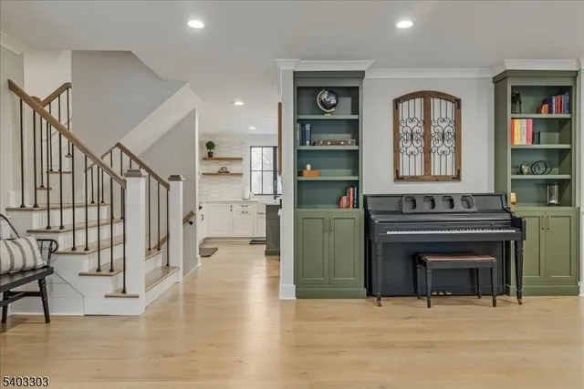 a kitchen with stainless steel appliances granite countertop a stove and a refrigerator