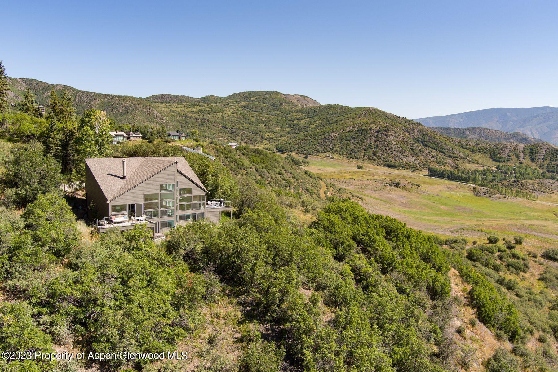 61 Oak Ridge Road Snowmass Village, CO 81615 - Photo 11 of 48 a view of a mountain with an ocean