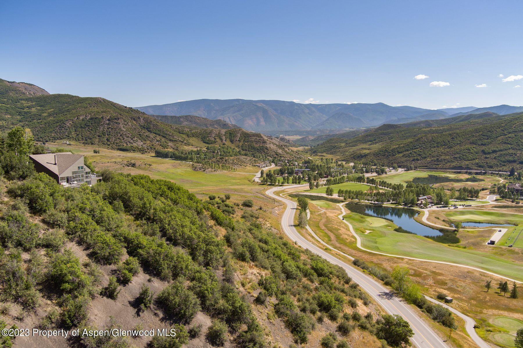 61 Oak Ridge Road Snowmass Village, CO 81615 - Photo 12 of 48 a view of a city with mountains in the background