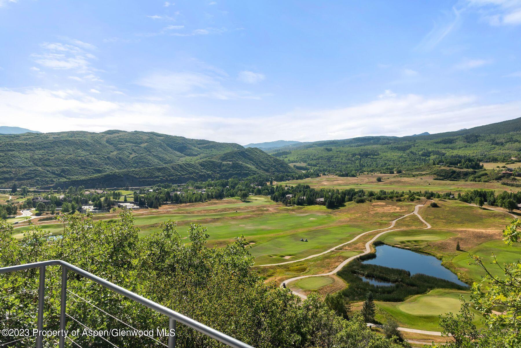 61 Oak Ridge Road Snowmass Village, CO 81615 - Photo 13 of 48 a view of a field with mountains in the background