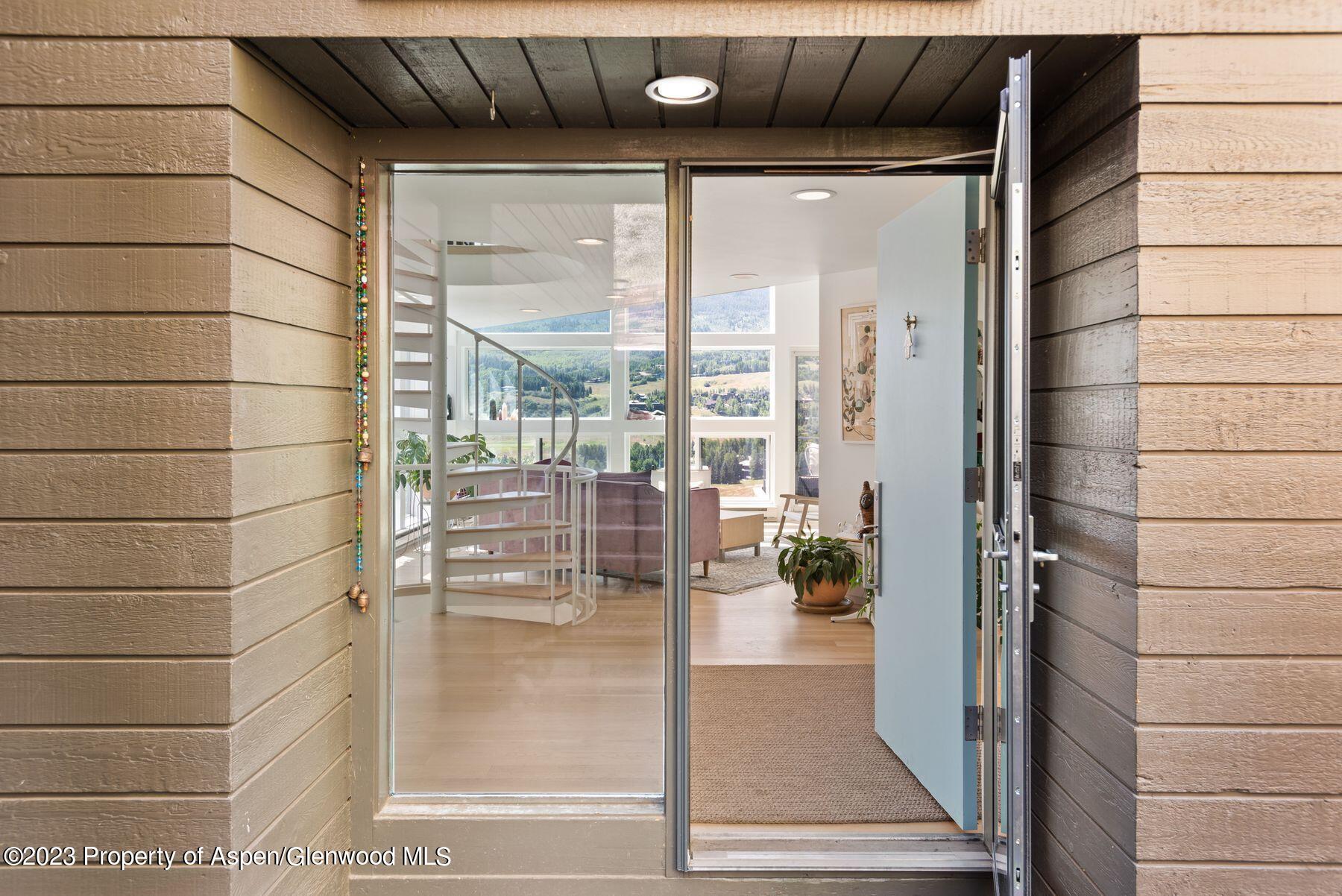 61 Oak Ridge Road Snowmass Village, CO 81615 - Photo 24 of 48 a bathroom with a glass shower door