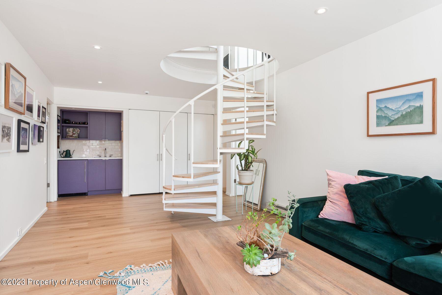 61 Oak Ridge Road Snowmass Village, CO 81615 - Photo 31 of 48 a living room with furniture and wooden floor