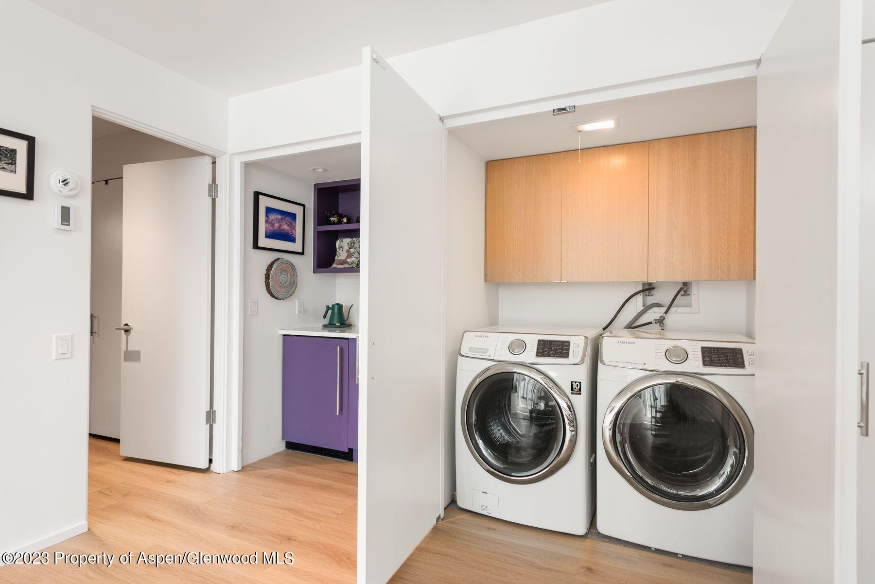 61 Oak Ridge Road Snowmass Village, CO 81615 - Photo 39 of 48 a view of a hallway with washer and dryer
