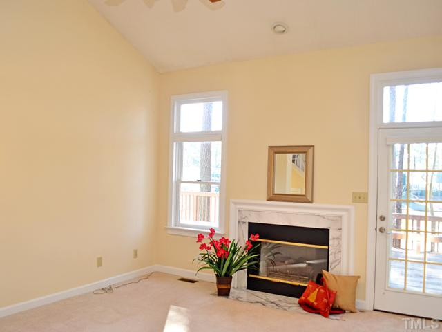 10013 Goodview Court Raleigh, NC 27613 - Photo 13 of 24 Vaulted Family Room w/ one of three fireplaces! Den/Family/Great Room