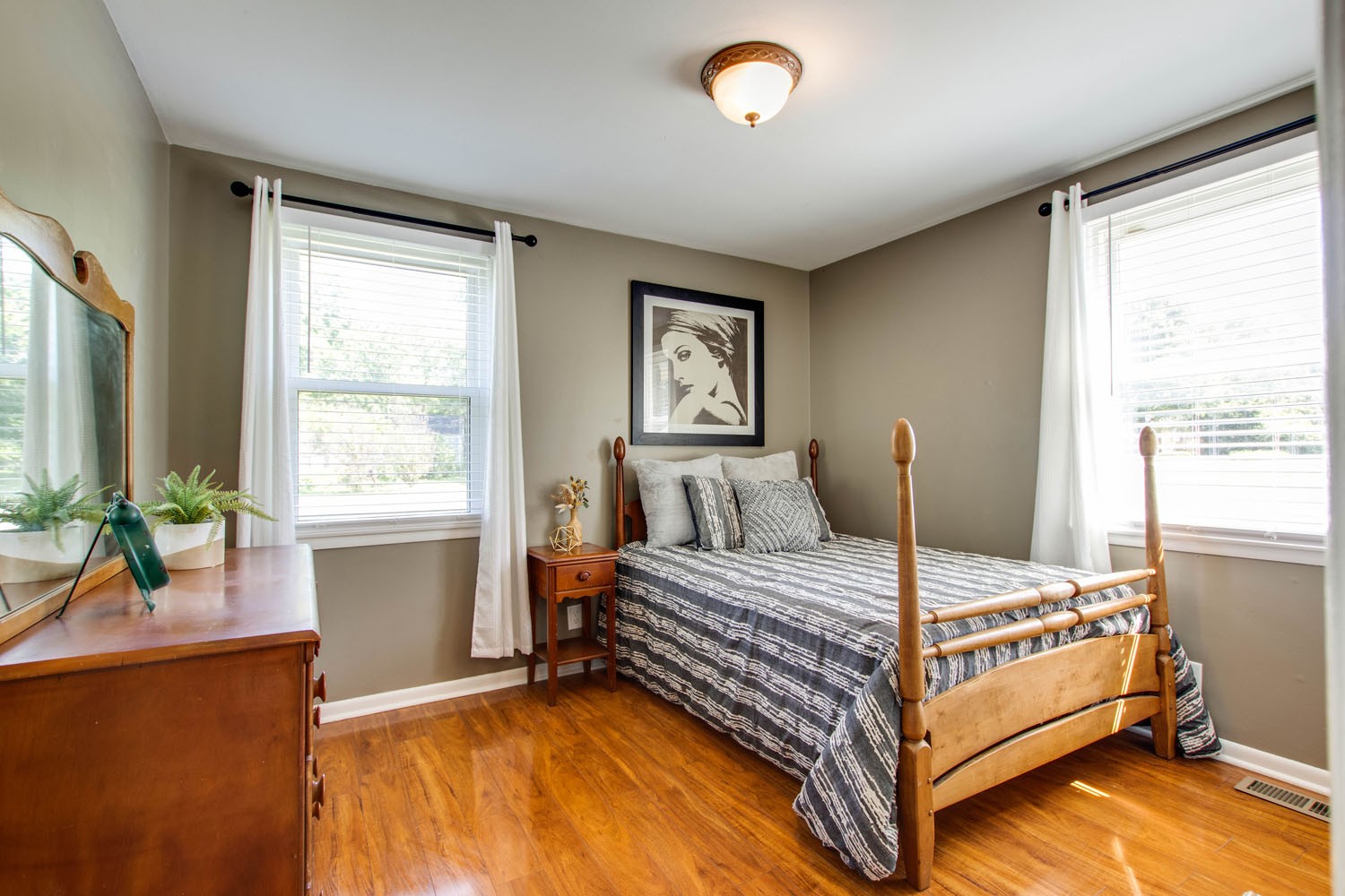 604 Cardinal Drive Murfreesboro, TN 37130 - Photo 12 of 16 a bedroom with a bed and windows