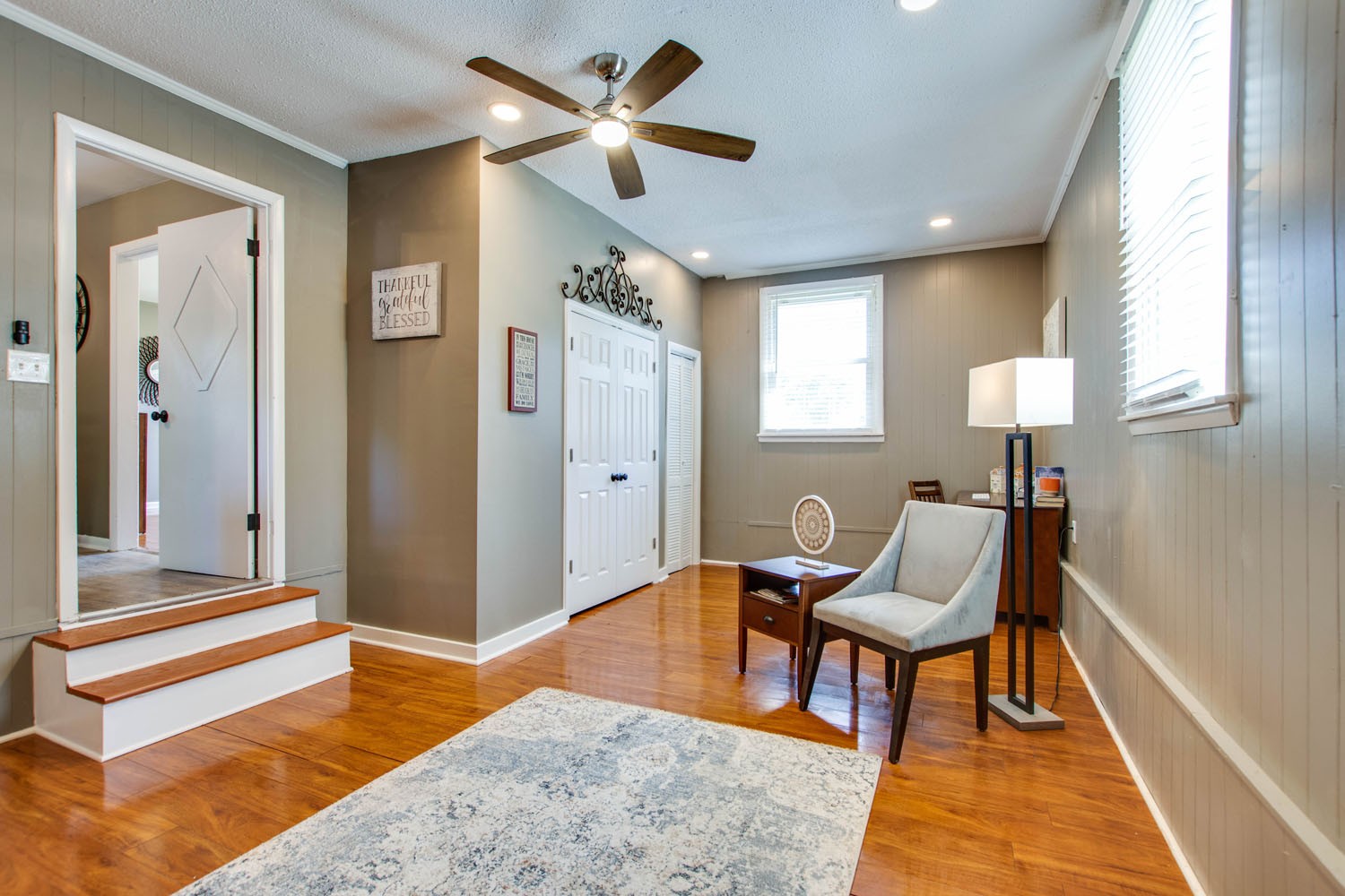 604 Cardinal Drive Murfreesboro, TN 37130 - Photo 14 of 16 a living room with furniture and a rug