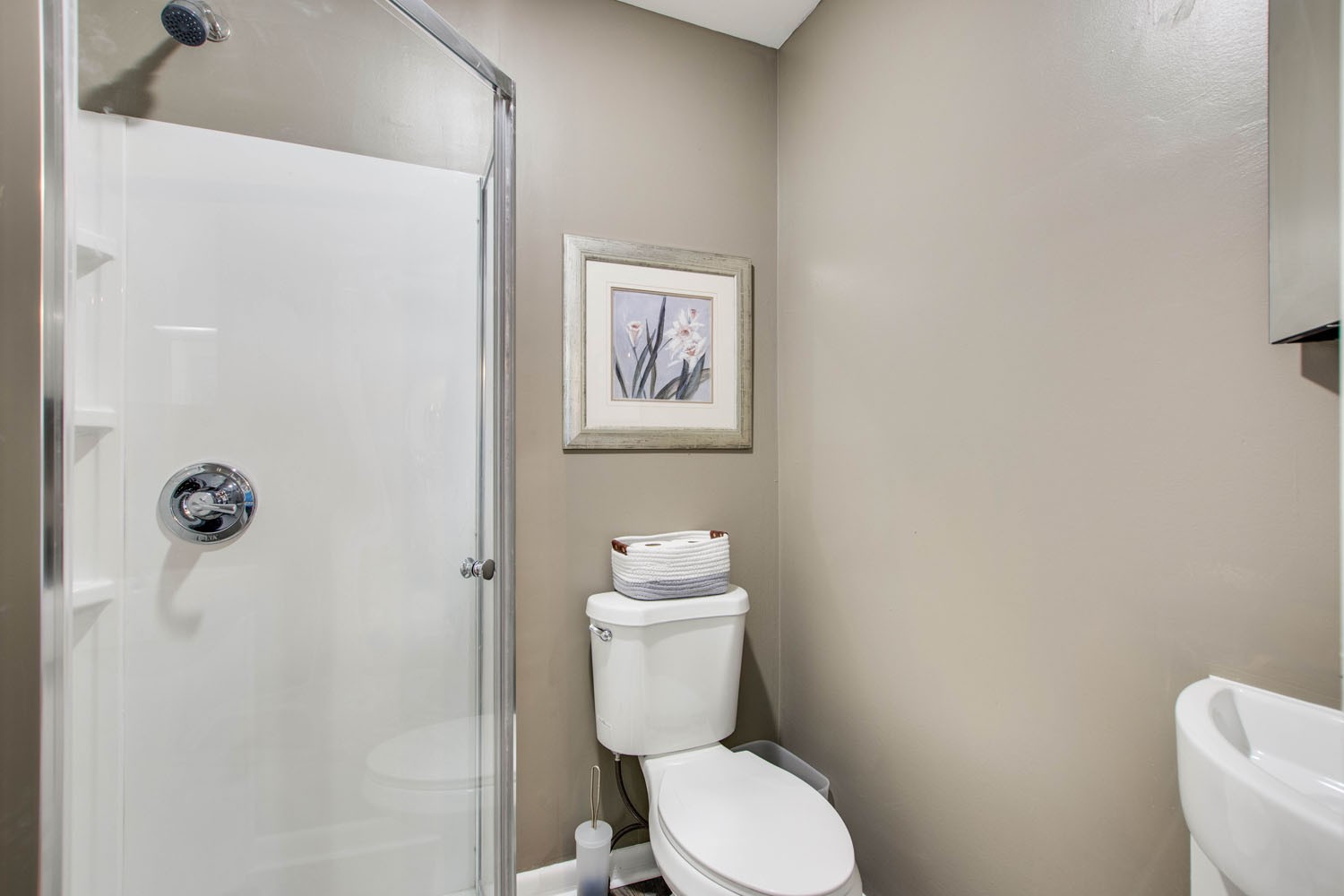 604 Cardinal Drive Murfreesboro, TN 37130 - Photo 15 of 16 a white toilet sitting next to a bathroom sink