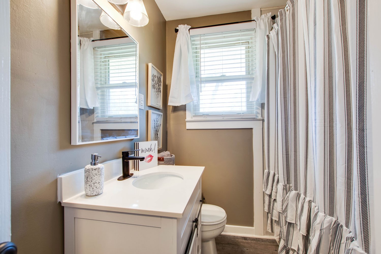 604 Cardinal Drive Murfreesboro, TN 37130 - Photo 10 of 16 a bathroom with a sink toilet and mirror