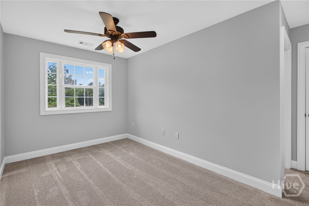 4016 Clyo-Kildare Road Clyo, GA 31303 - Photo 40 of 58 Open bonus area top of stairs
