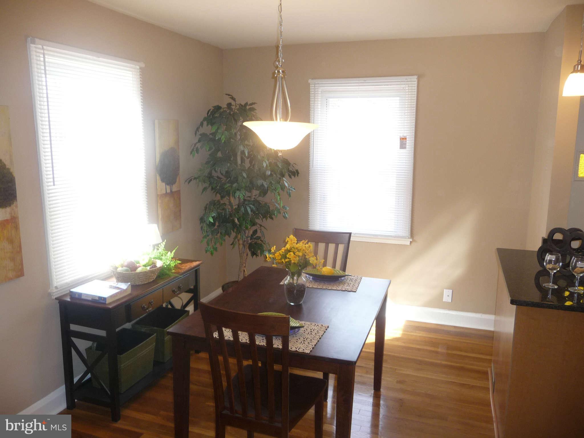 1018 Witherspoon Road Baltimore, MD 21212 - Photo 4 of 19 a view of a dining room with furniture and window