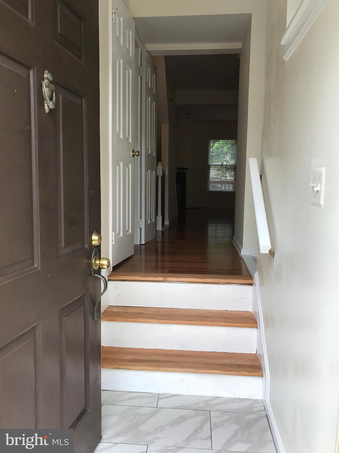 10504 Grove Ridge Place, Unit 48 Rockville, MD 20852 - Photo 2 of 30 a view of staircase with white walls