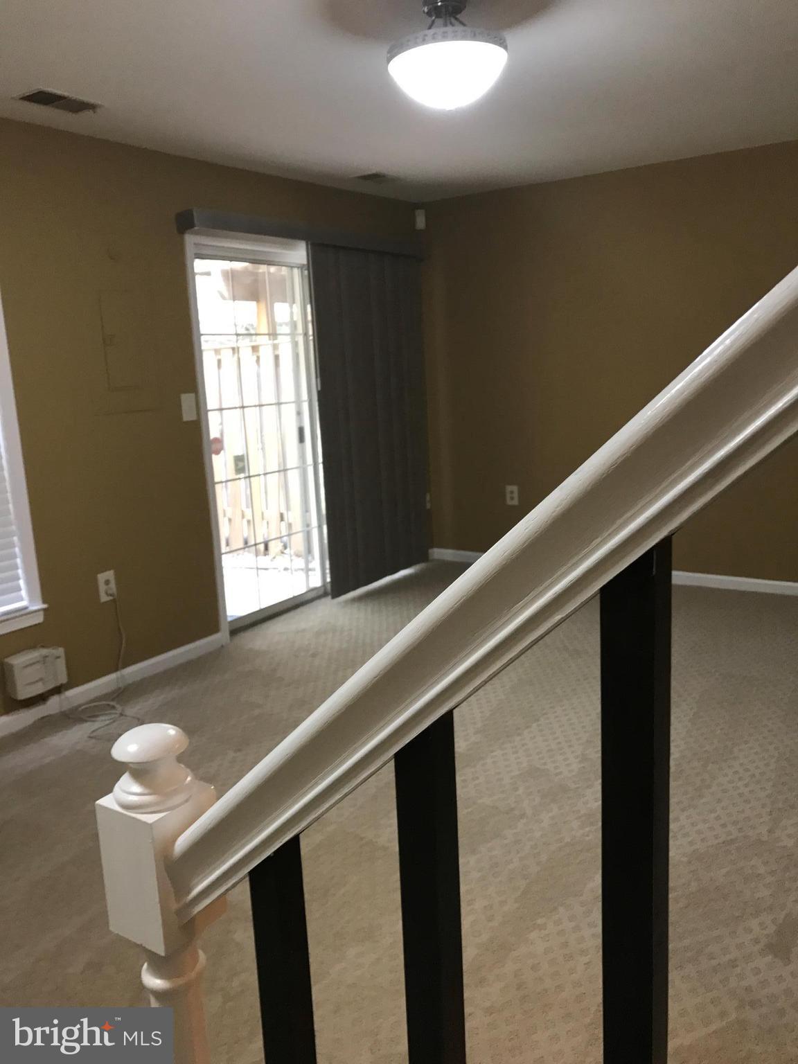 10504 Grove Ridge Place, Unit 48 Rockville, MD 20852 - Photo 24 of 30 a view of an empty room with a window
