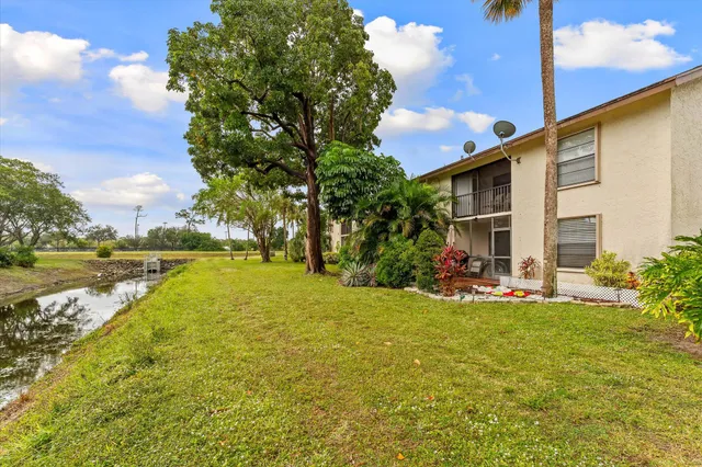 a view of a house with a swimming pool