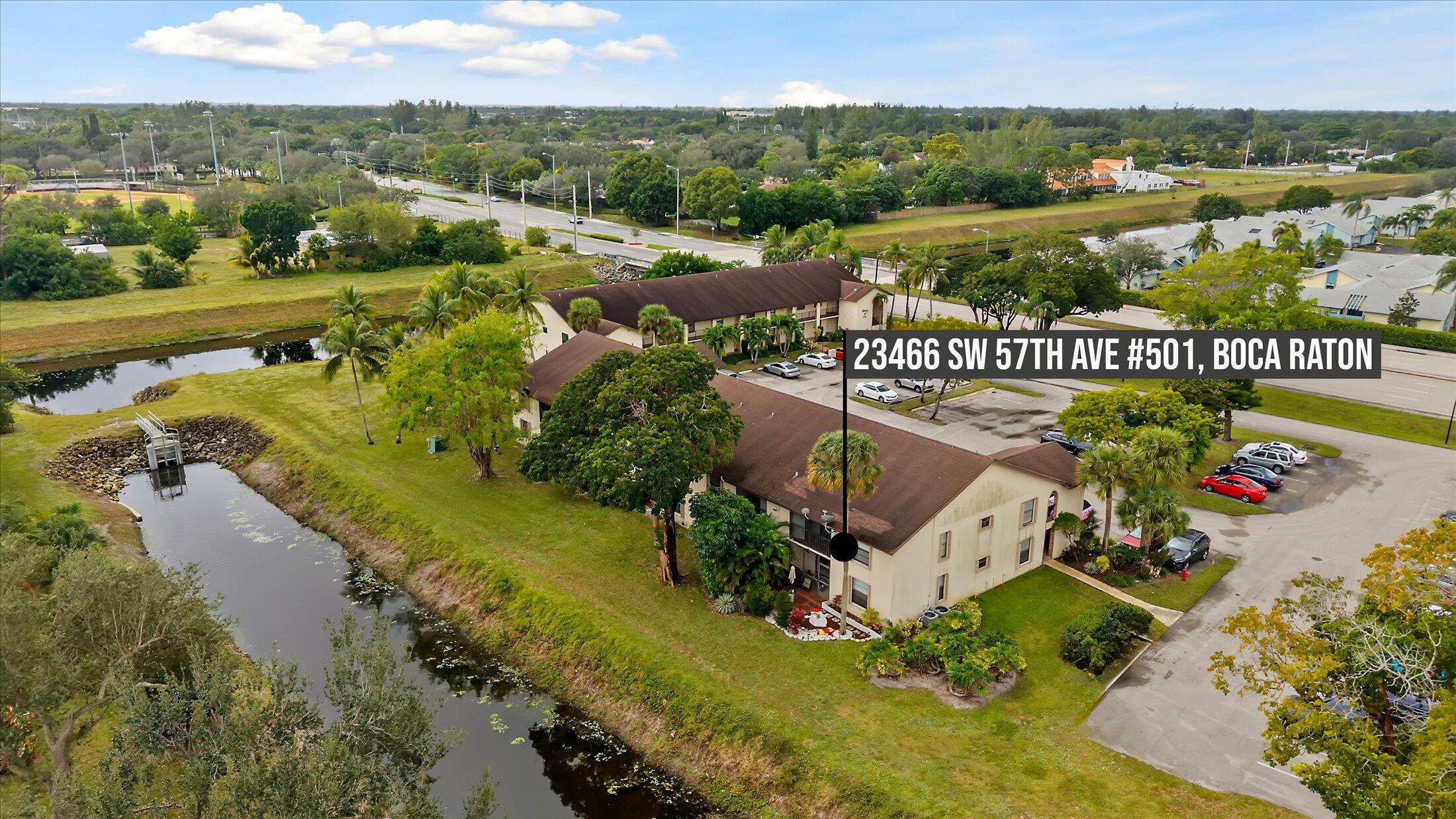 23466 Lyons Road, Unit 501 Boca Raton, FL 33428 - Photo 34 of 40 an aerial view of a city with mountains ocean view