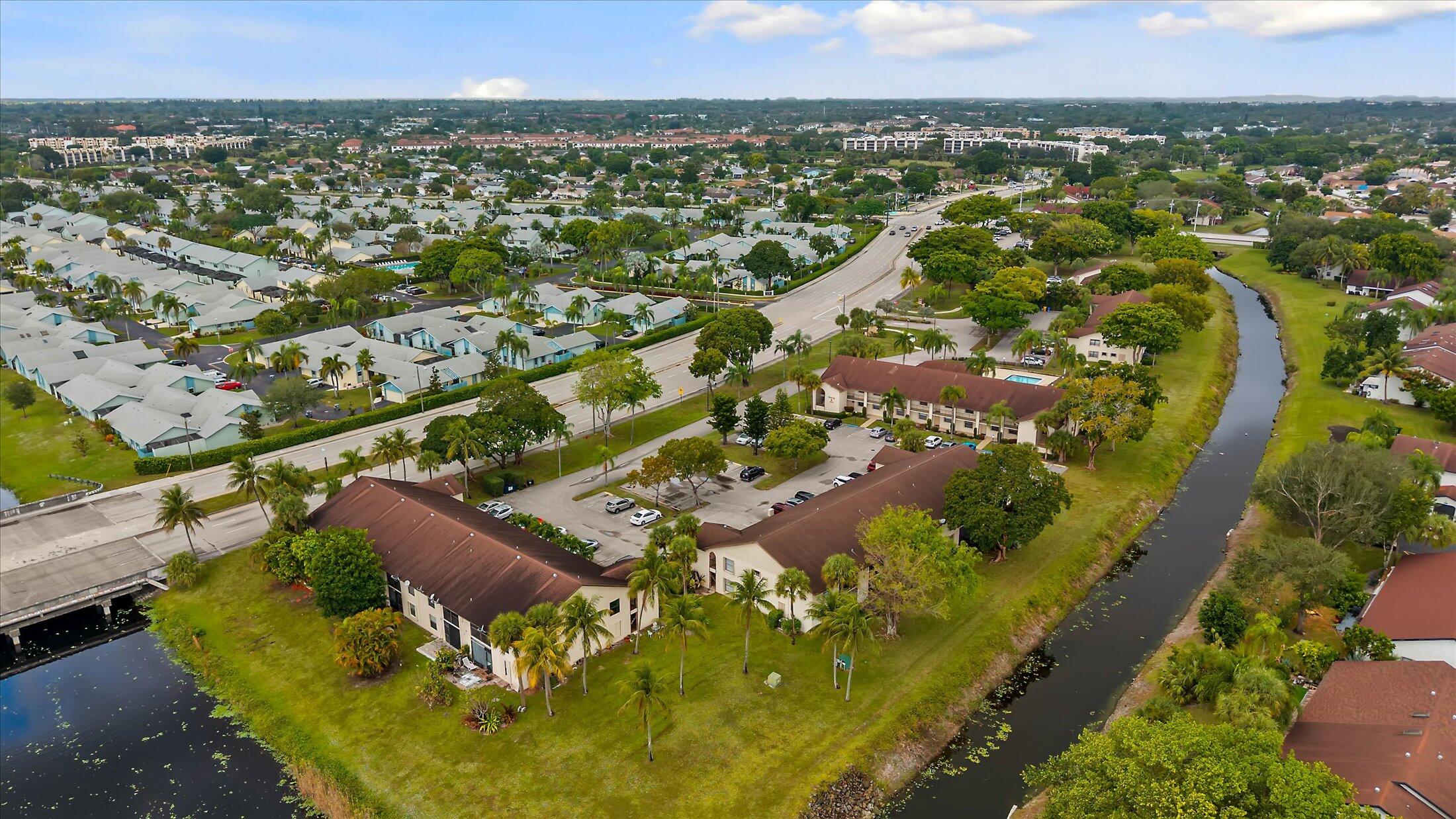 23466 Lyons Road, Unit 501 Boca Raton, FL 33428 - Photo 39 of 40 an aerial view of residential houses with outdoor space