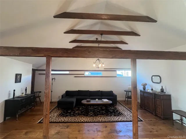 a living room with a rug