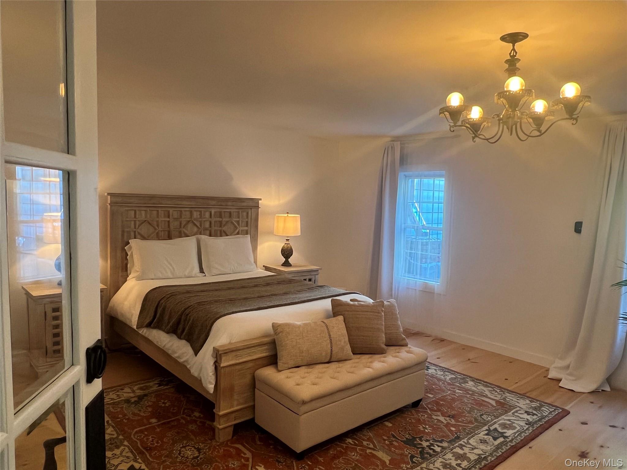 354 Main Street Catskill, NY 12414 - Photo 7 of 15 a bedroom with bed and window