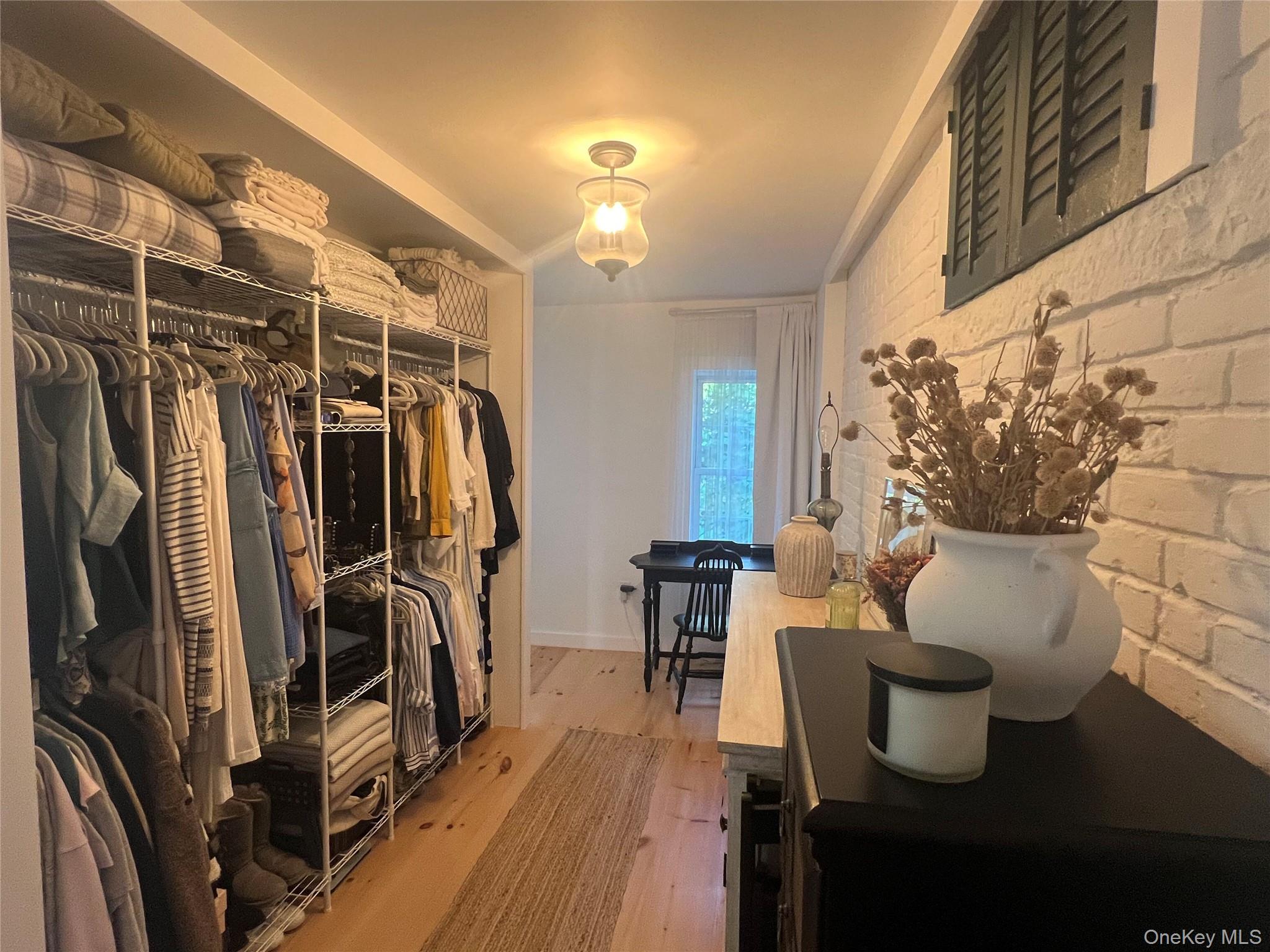 354 Main Street Catskill, NY 12414 - Photo 8 of 15 a walk in closet with wooden floor