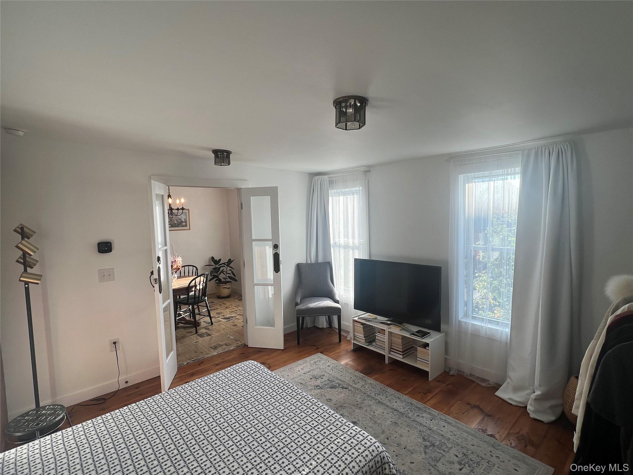 354 Main Street Catskill, NY 12414 - Photo 10 of 15 a living room with furniture and a flat screen tv