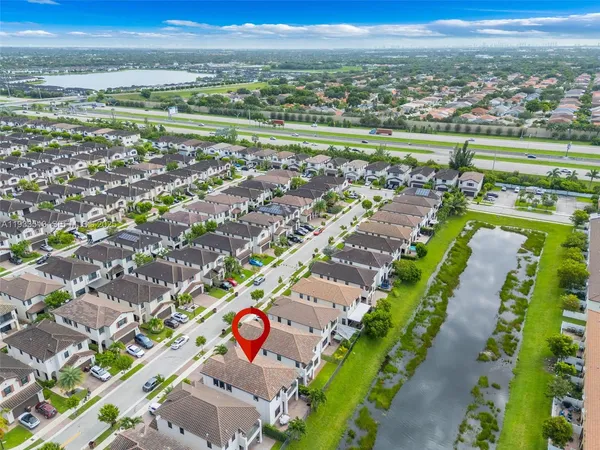 a view of a city with a lake