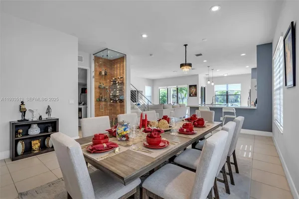 a outdoor dining room with furniture and window