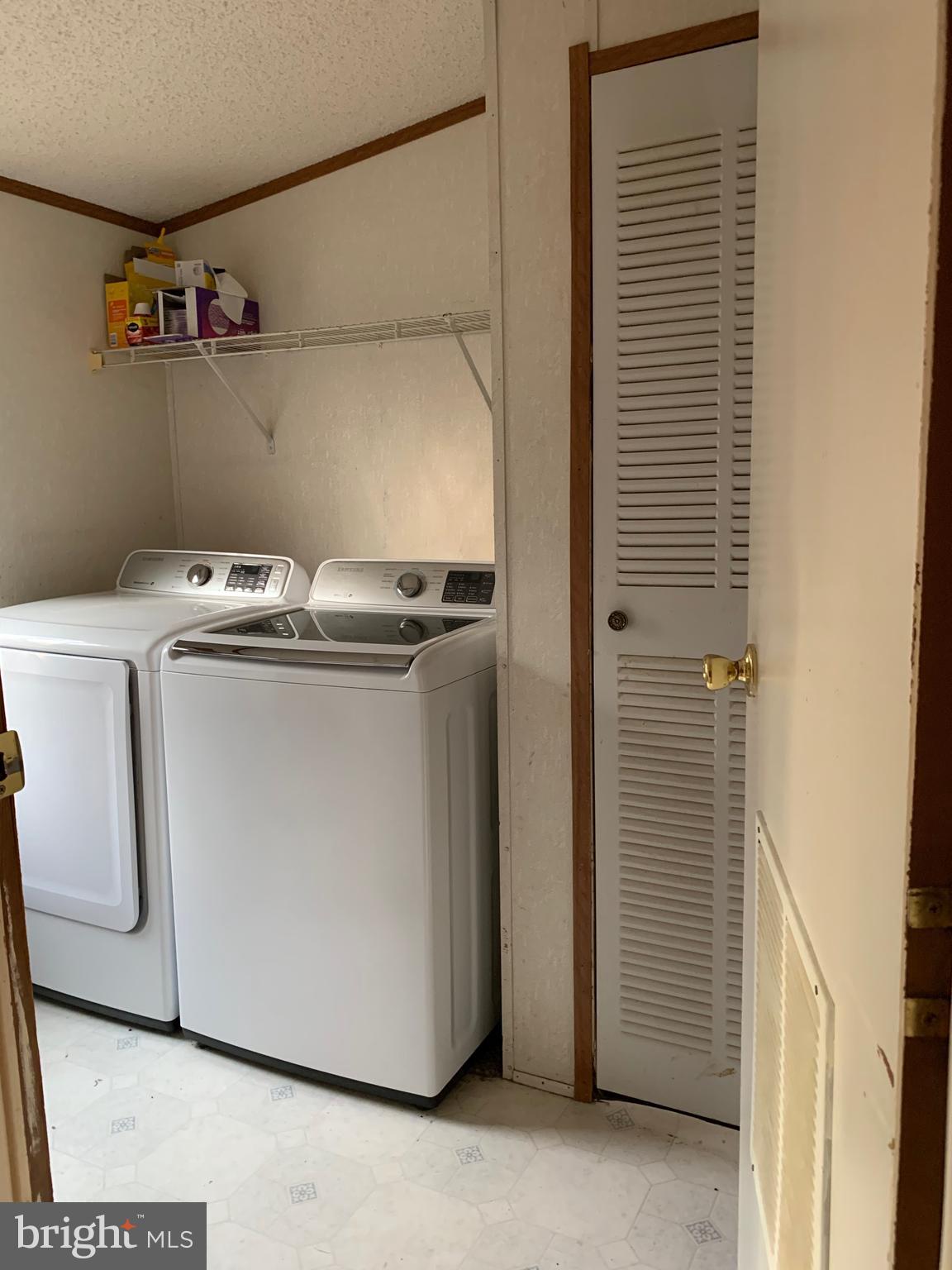 233 Short Kearneysville, WV 25430 - Photo 19 of 33 Laundry Room on Main Floor with Shelving