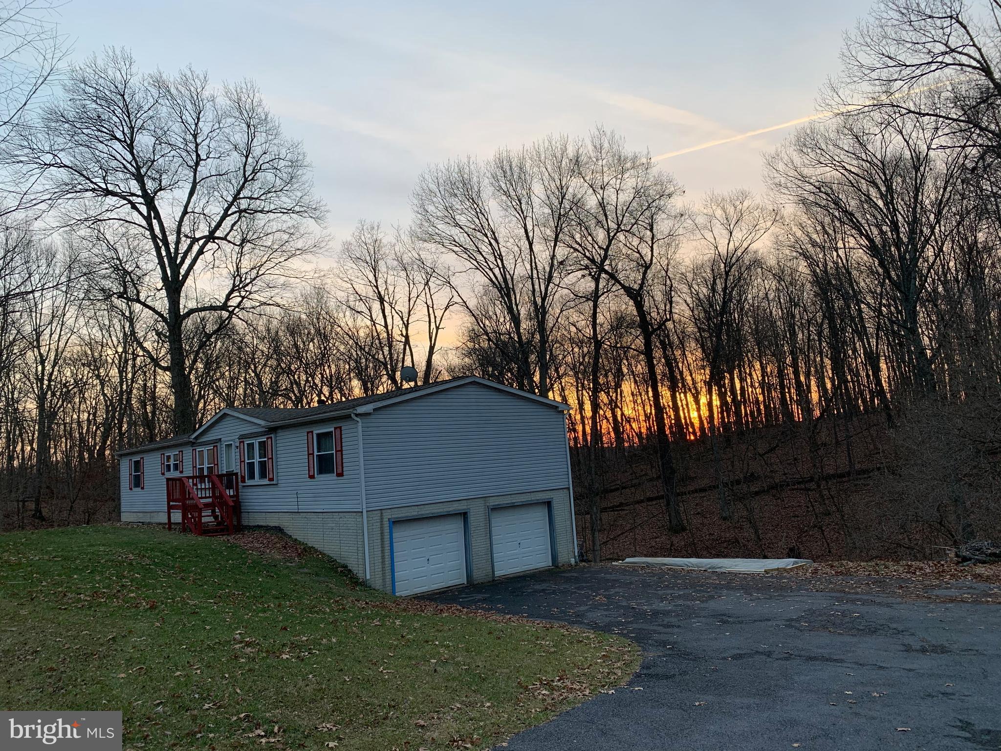 233 Short Kearneysville, WV 25430 - Photo 27 of 33 Exterior View of 2 Car Garage Blacktop driveway