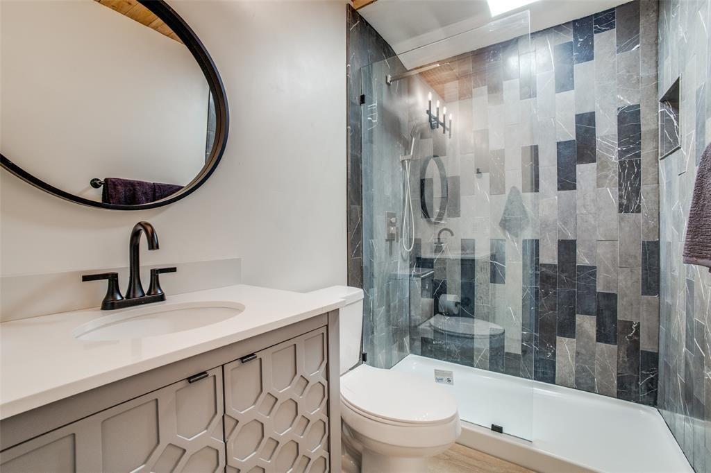 122 Allen Street Mabank, TX 75156 - Photo 6 of 10 a bathroom with a sink toilet and shower