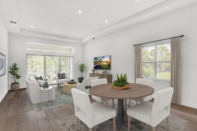 a view of a dining room with furniture window and outside view