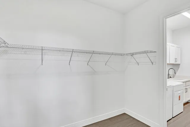 a view of a room with racks on the wall