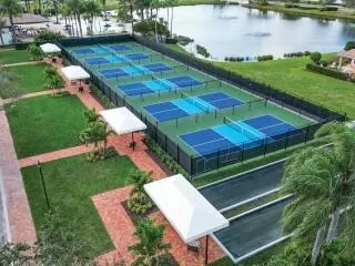 a view of a backyard with sitting area