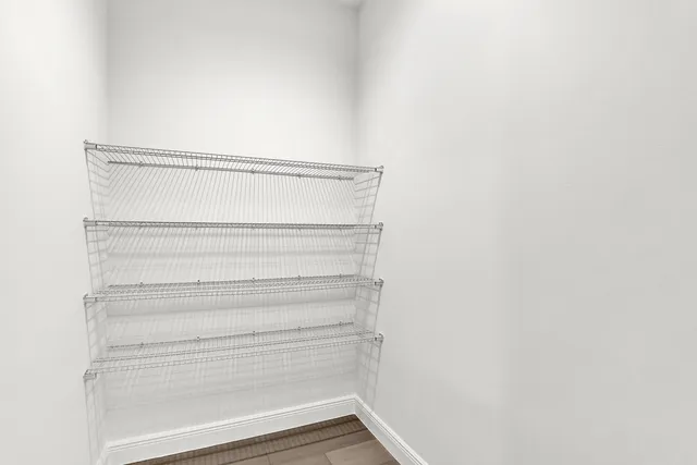 a view of small space with racks on the wall