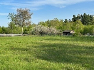 37 Smith Road Warwick, MA 01378 - Photo 17 of 21 a backyard of a house with lots of green space and outdoor seating