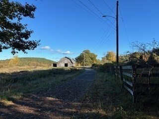 37 Smith Road Warwick, MA 01378 - Photo 4 of 21 a view of a backyard of the house