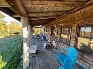 37 Smith Road Warwick, MA 01378 - Photo 6 of 21 a view of a porch with furniture