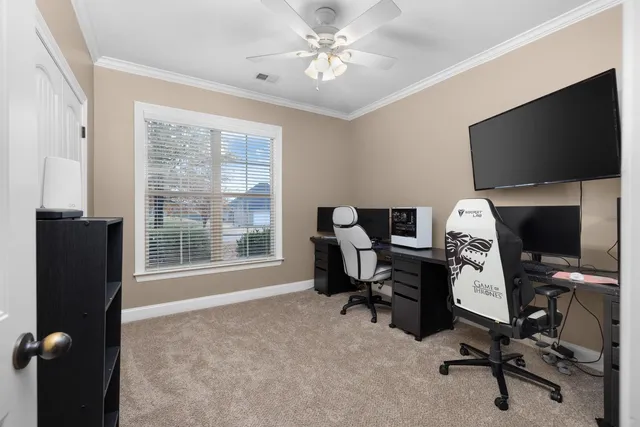 a en suite bathroom with a double vanity sink a mirror and a bathtub