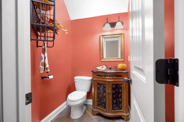 a bathroom with a toilet and a sink