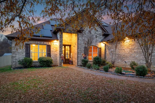a front view of a house having yard
