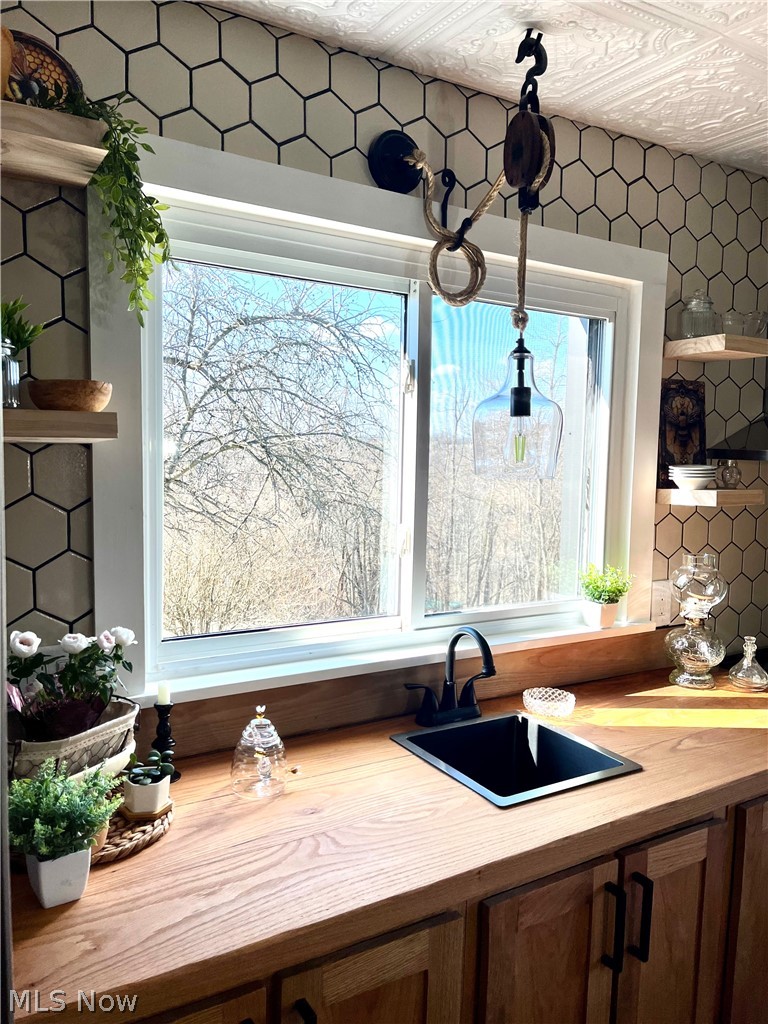 12972 Gilmore Road Southeast Port Washington, OH 43837 - Photo 13 of 50 Kitchen featuring open shelves and light countertops