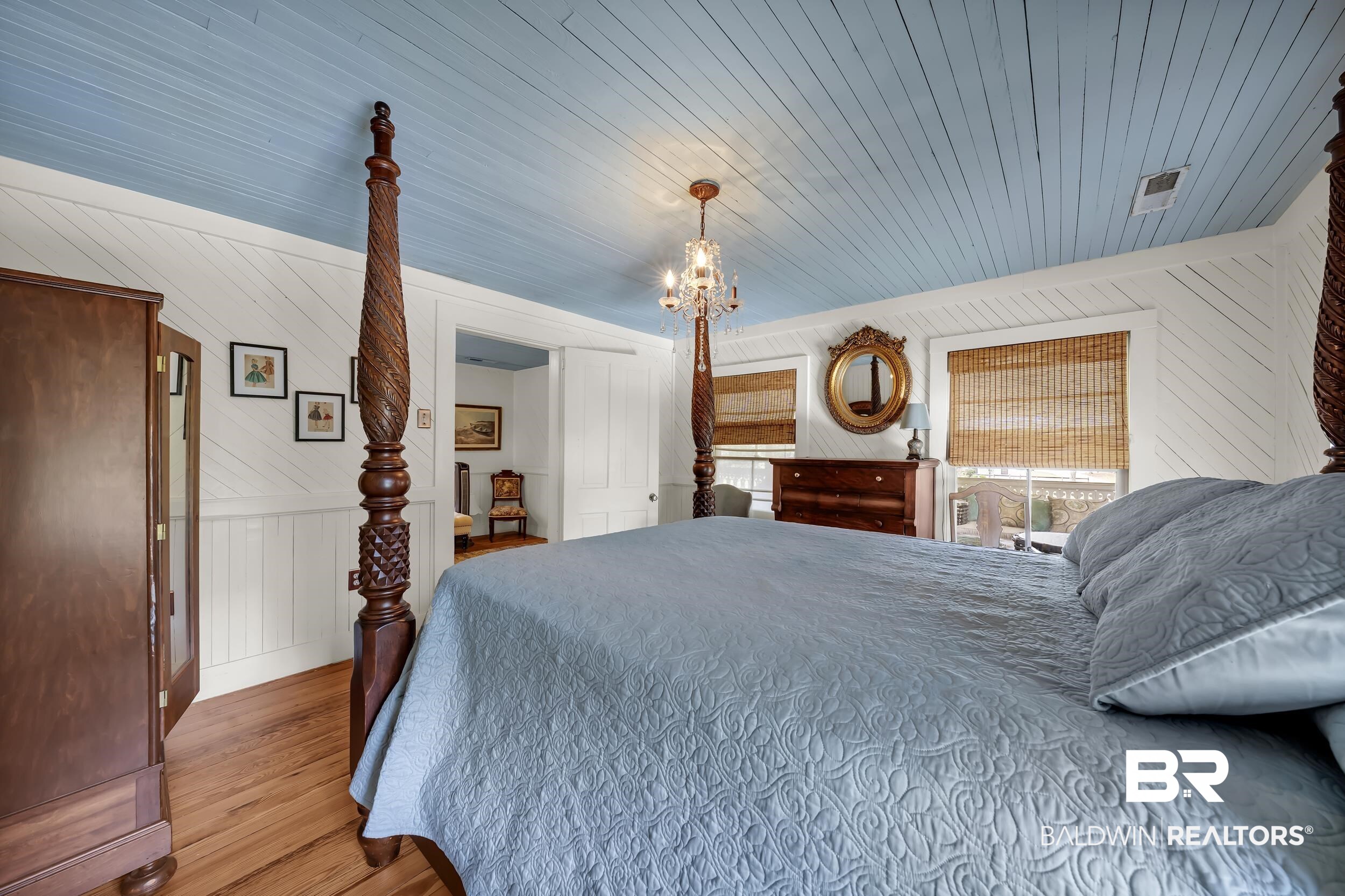 13232 Mary Ann Bch Road Fairhope, AL 36532 - Photo 39 of 79 Bedroom with wood finished floors, wooden walls, wood ceiling, and a chandelier