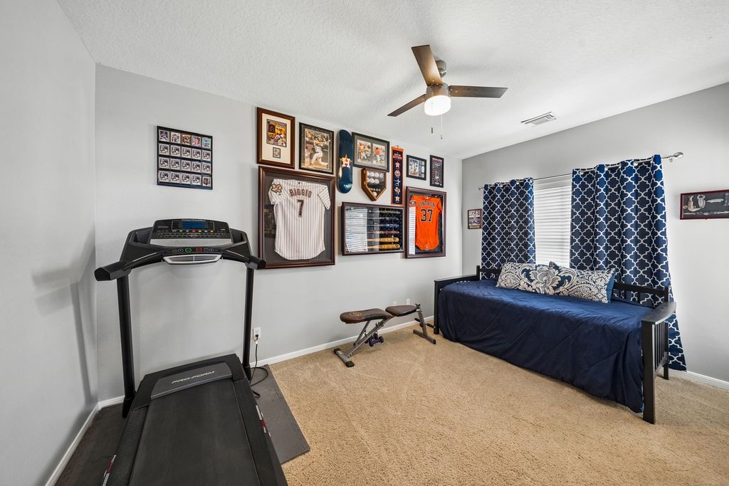 1607 Schooner Point Willis, TX 77318 - Photo 14 of 47 Secondary bedroom #1 conveniently located on the 1st floor