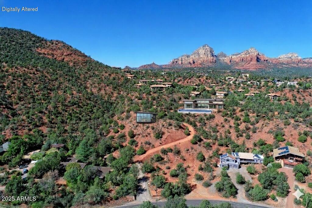 463 Brewer Road Sedona, AZ 86336 - Photo 2 of 22 an aerial view of residential houses with outdoor space and trees