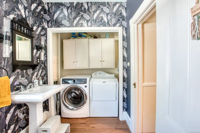 a utility room with dryer and washer