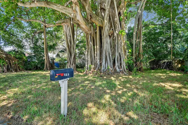 a fire hydrant in the middle of a field