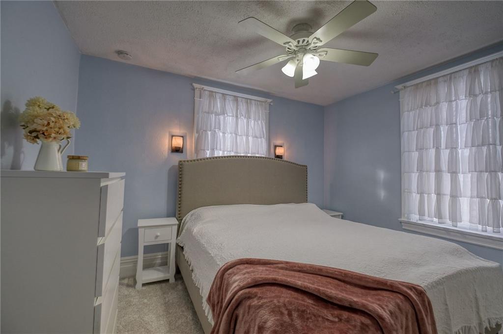 629 George Street Coraopolis, PA 15108 - Photo 16 of 25 Tranquil master bedroom with newer ceiling fan and carpeting.