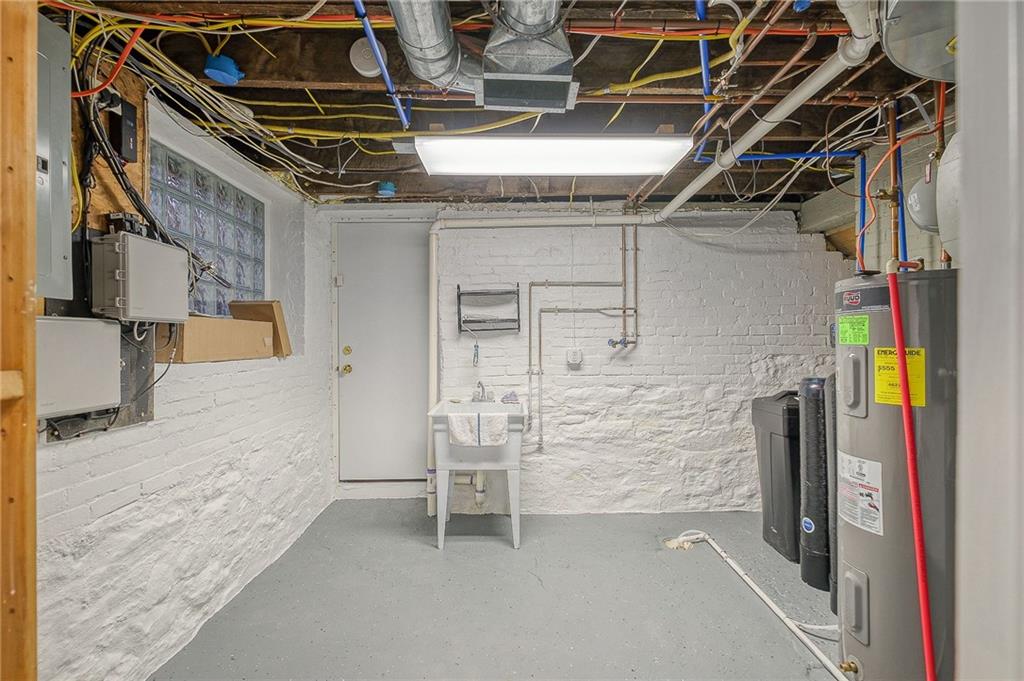 629 George Street Coraopolis, PA 15108 - Photo 23 of 25 2 new glass block windows in basement , newer steel door, whole huse water softener and osmosis filter.