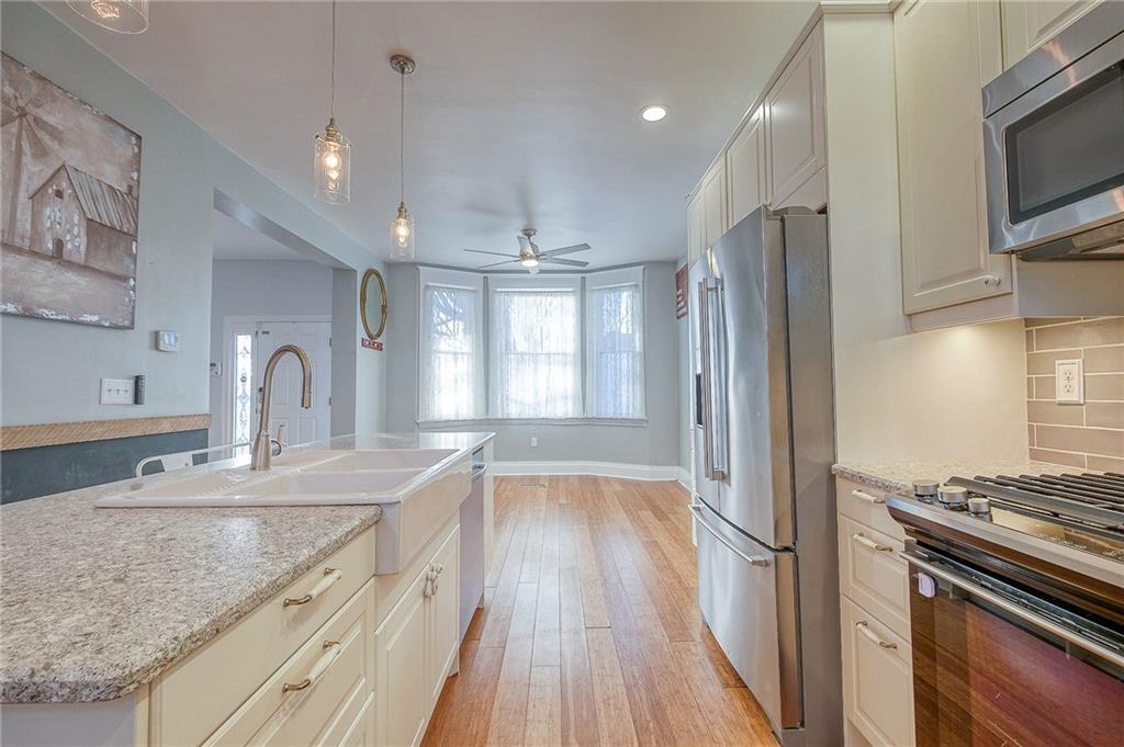 629 George Street Coraopolis, PA 15108 - Photo 4 of 25 Kitchen open to dining room.