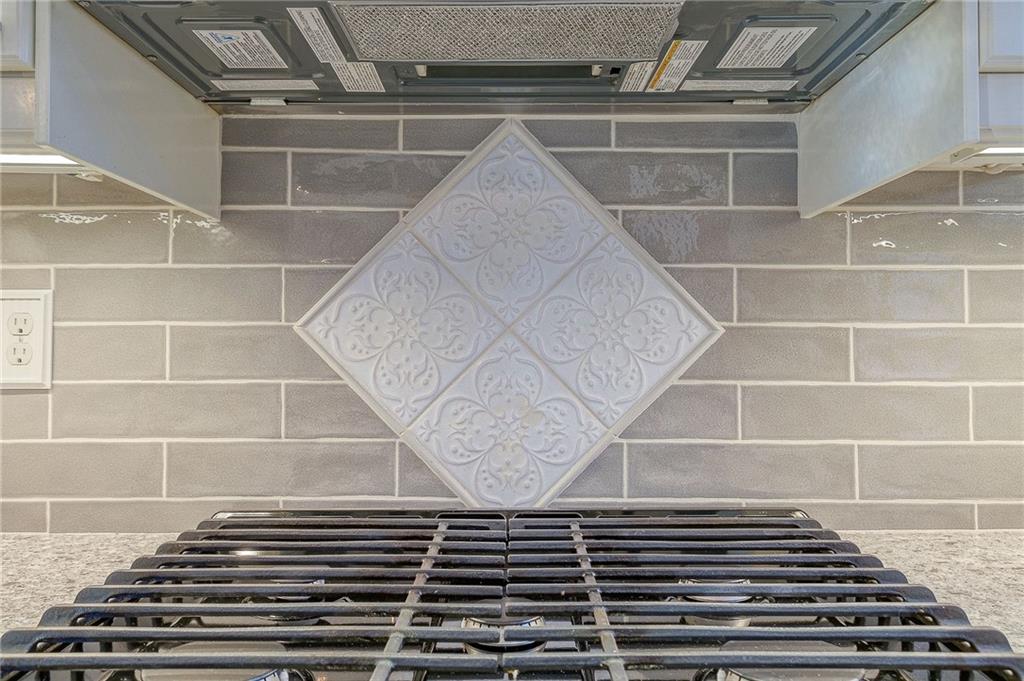 629 George Street Coraopolis, PA 15108 - Photo 7 of 25 Custome designed backsplash is a beautiful accent to this stylish kitchen.