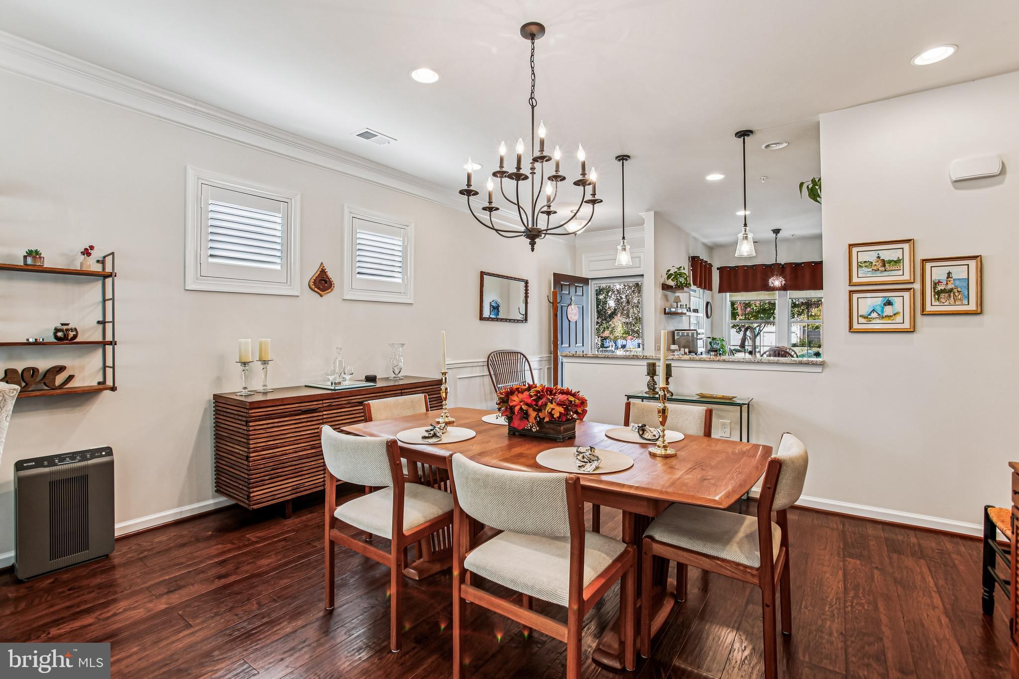 187 Denison Street Fredericksburg, VA 22406 - Photo 12 of 40 a view of a dining room with furniture wooden floor and a chandelier