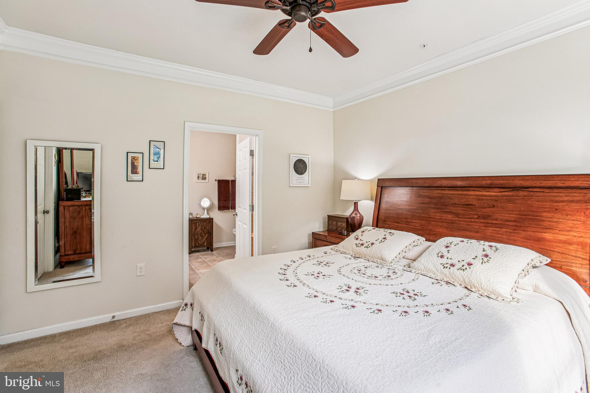 187 Denison Street Fredericksburg, VA 22406 - Photo 21 of 40 a bed room with a bed and a chandelier